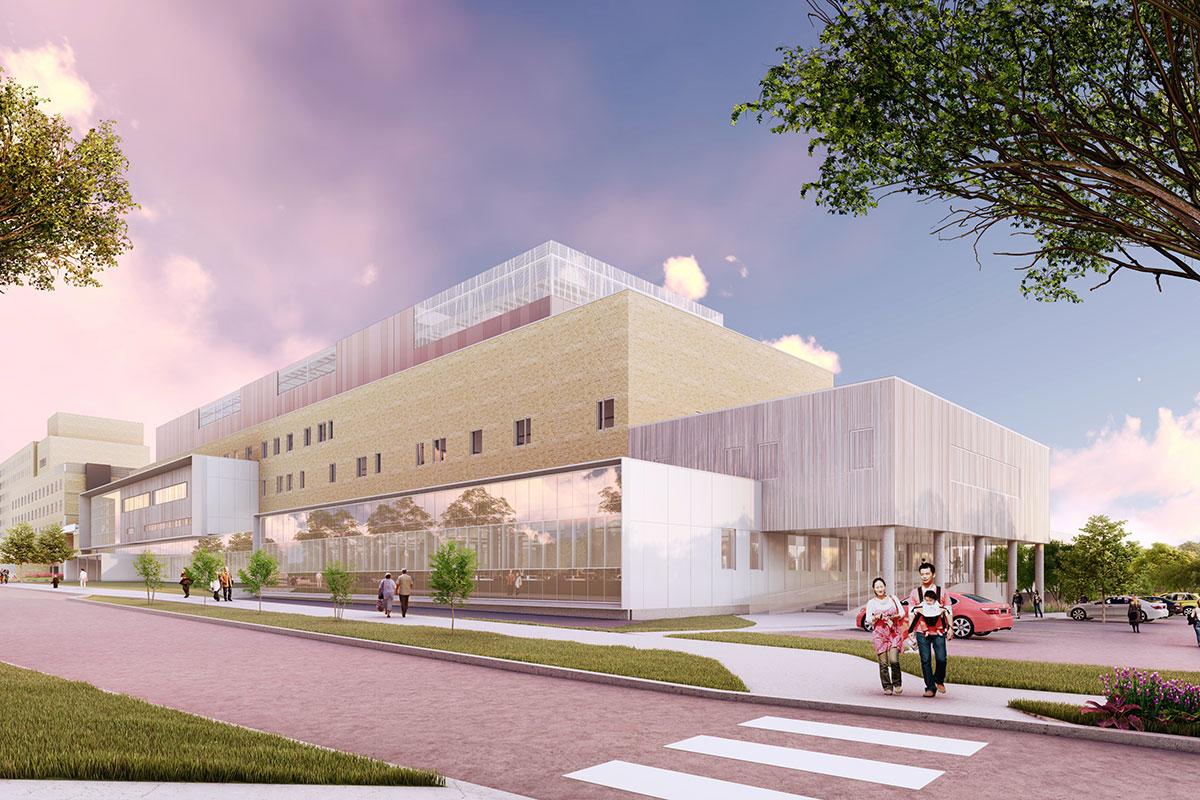 Exterior view of the Fleurimont Hospital in Sherbrooke, featuring contemporary architecture with light brick and metal panels, a glass entrance, and pedestrians on the sidewalk